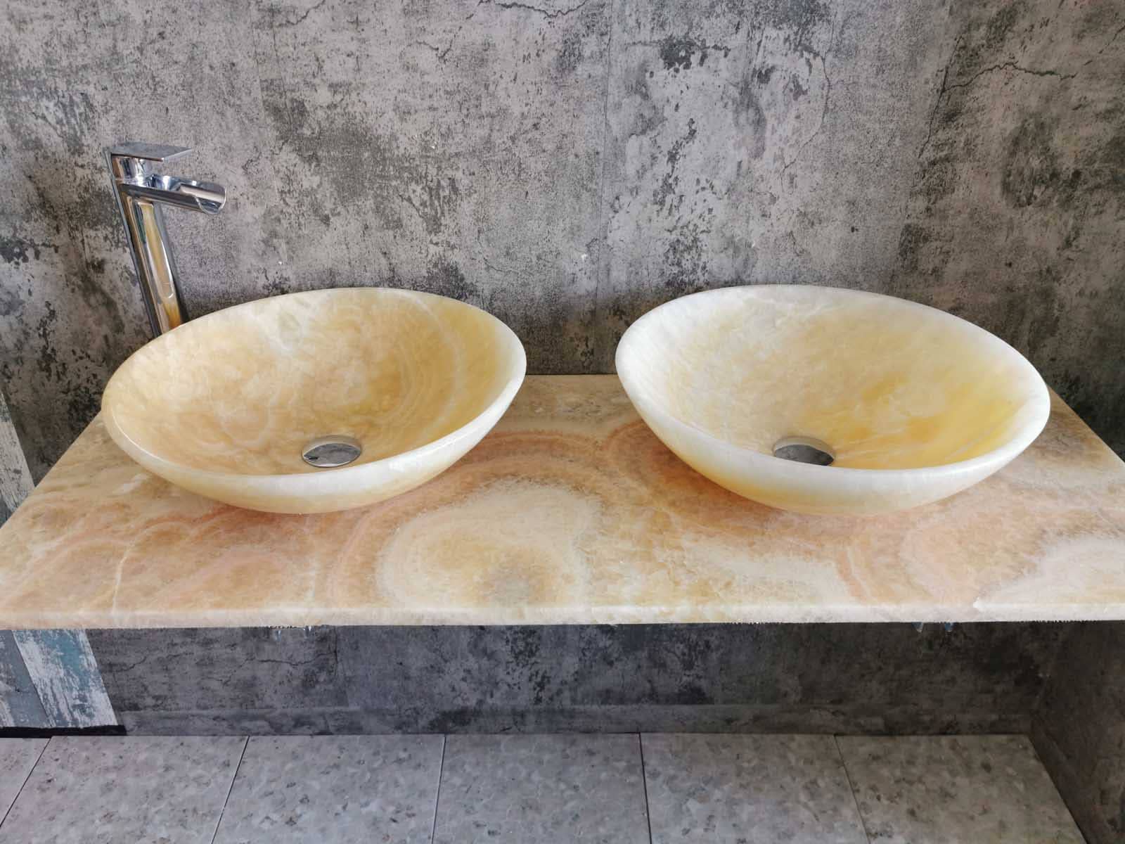 lavabi design bagno in marmo onice giallo rotondi
