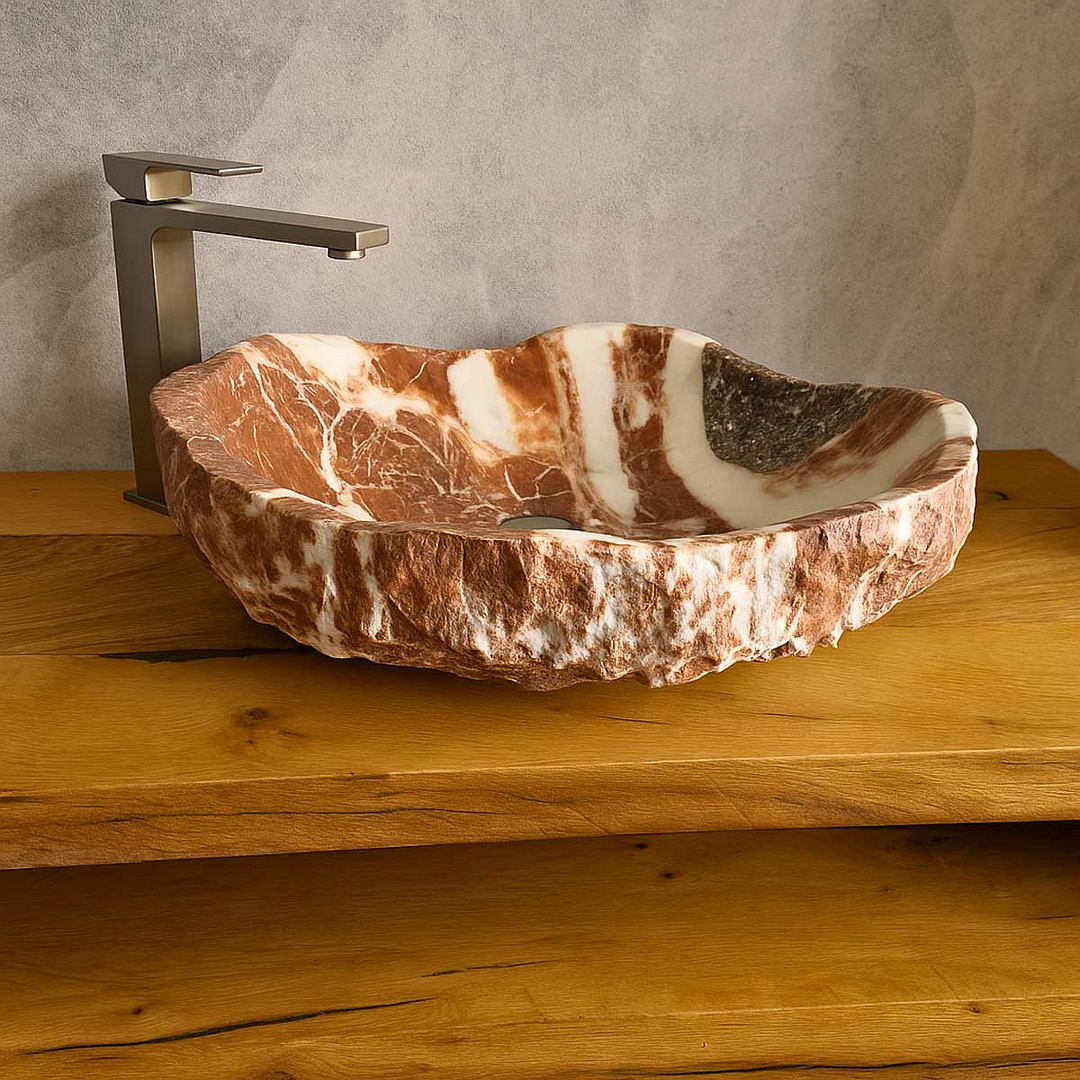 lavabo rosso in marmo grezzo da appoggio ovale