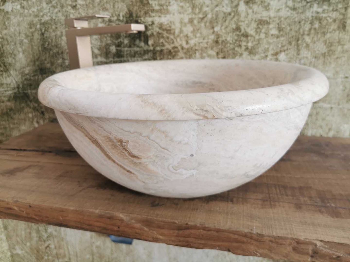 lavabo rotondo in travertino