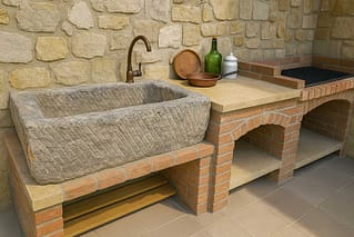 Lavello da esterno in granito antico 128x53 cm
