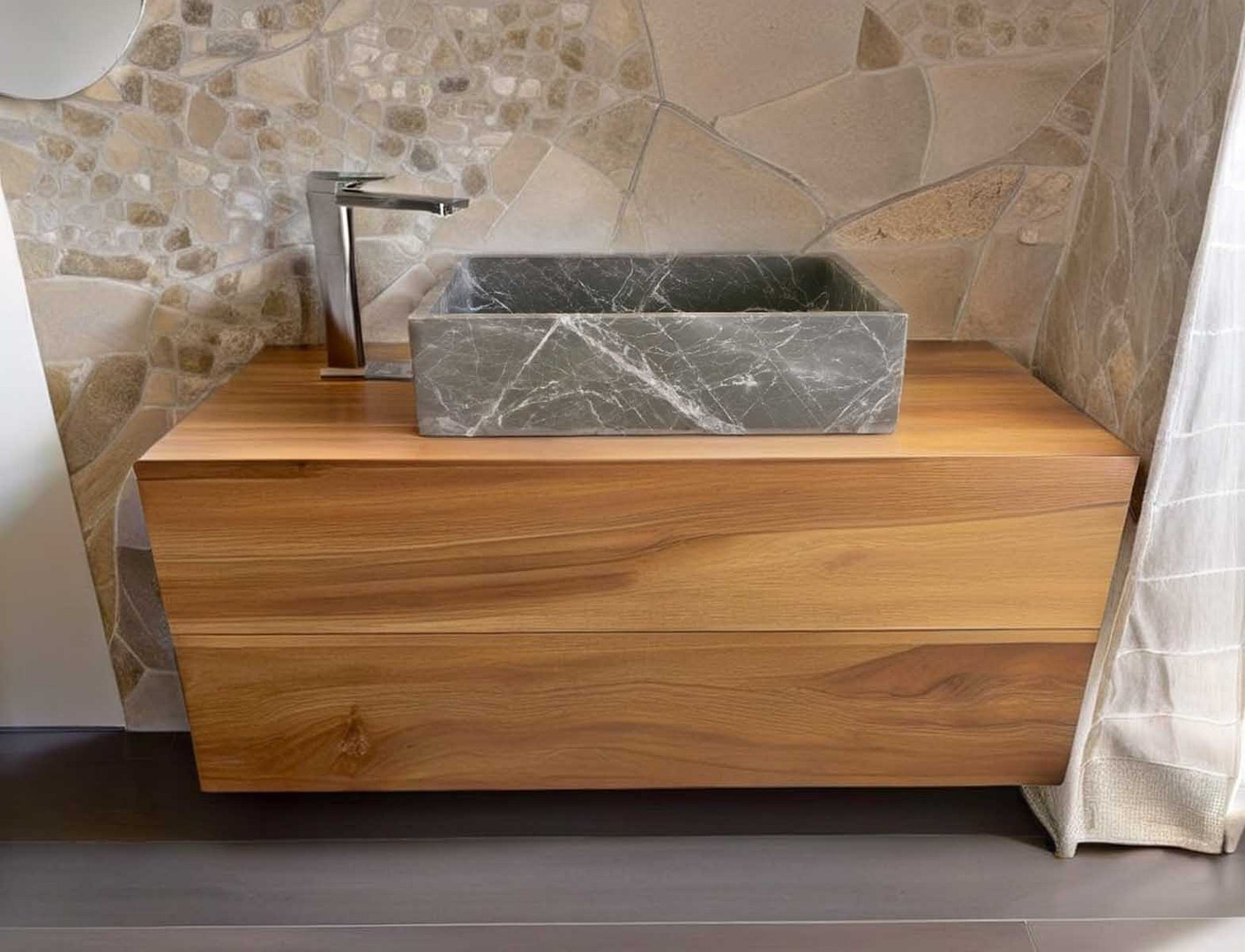 lavabo grigio moderno in pietra da appoggio