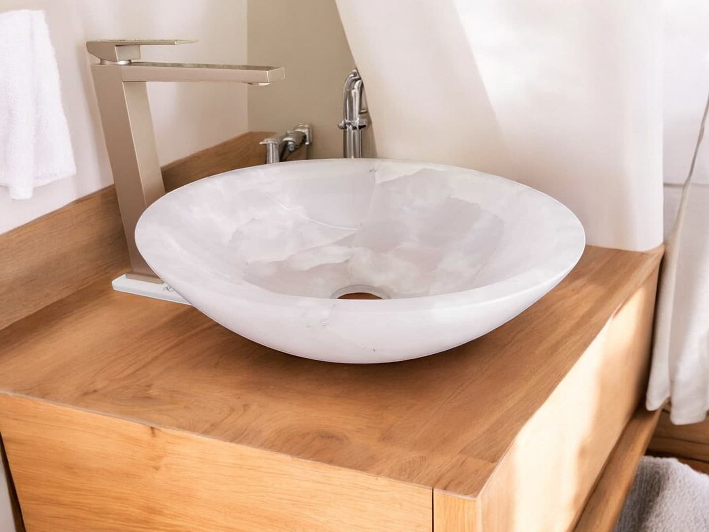 lavabo particolare di design in marmo onice rosa